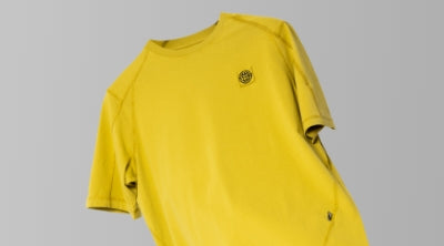 Yellow ST95 T-shirt, illustrating the garment dyeing process and fabric tone variation.