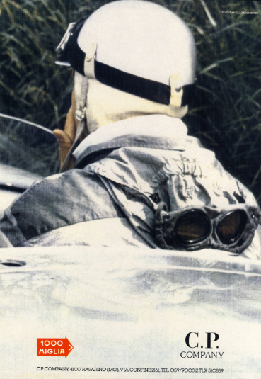 C.P. Company promotional banner showing a driver in a silver jacket with goggles, helmet, and 1000 Miglia logo.