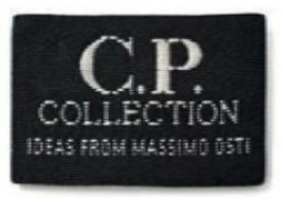 1987 C.P. Collection label in black with white text reading “C.P. Collection – Ideas from Massimo Osti.”
